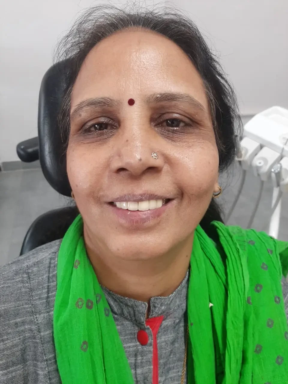 Patient portrait after dental treatment.